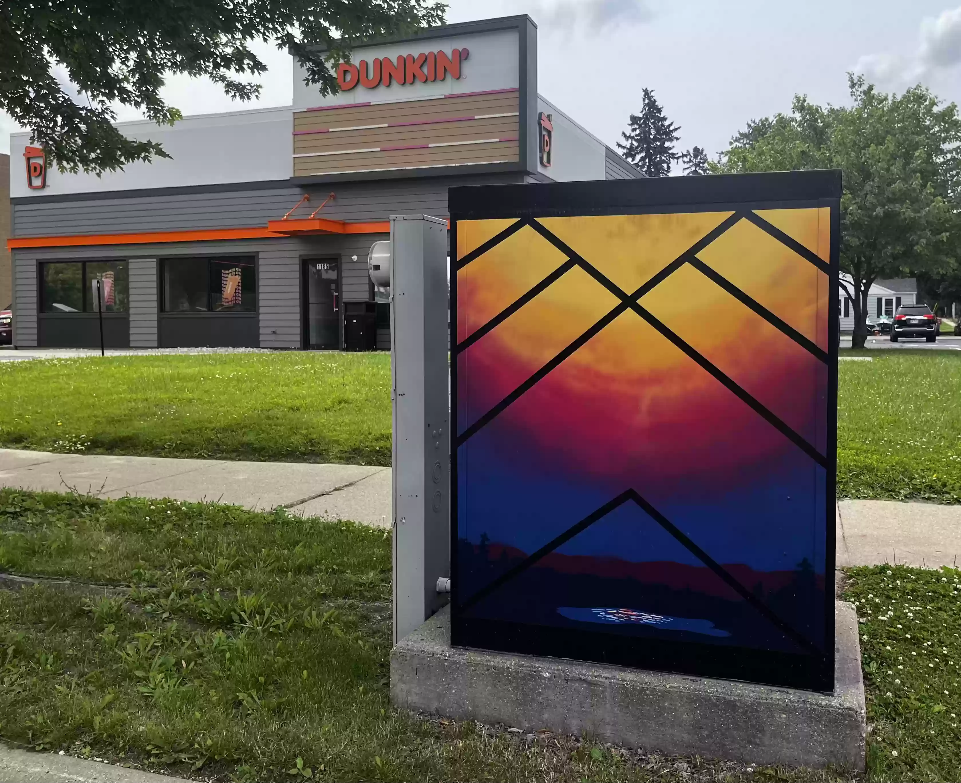 Box 10 with Dunkin store in background