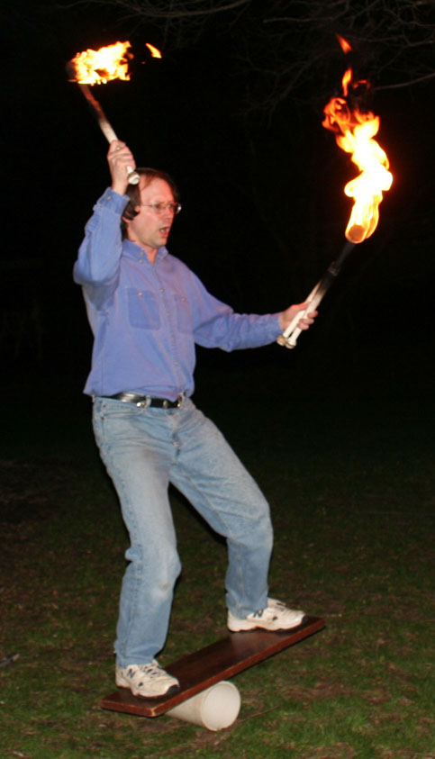 Picture of Steven Sahyun juggling
	fire